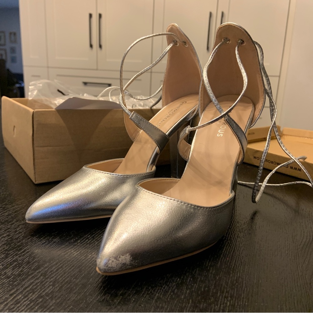 Brand new in box silver heels